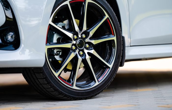 sports car wheels, low profile tires on aluminum rims, closeup